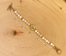 Load image into Gallery viewer, Multi Strand Pearl And Gold Clasp Bracelet