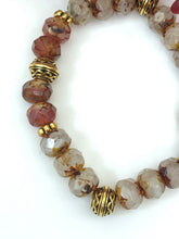 Load image into Gallery viewer, Crystal And Gold Stretch Bracelet With A Celtic Charm