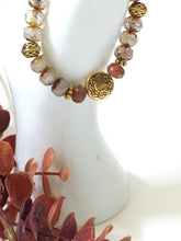 Load image into Gallery viewer, Crystal And Gold Stretch Bracelet With A Celtic Charm