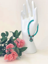 Load image into Gallery viewer, Blue Crystal Beaded Bracelet With Patina Finished Shell Charm