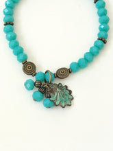 Load image into Gallery viewer, Blue Crystal Beaded Bracelet With Patina Finished Shell Charm