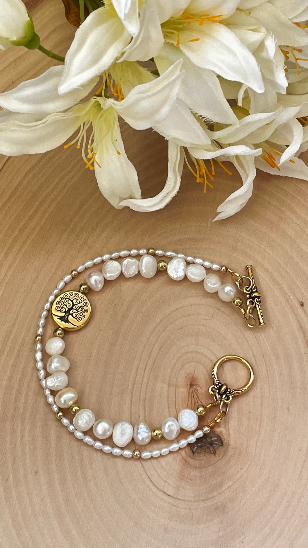 Multi Strand Pearl And Gold Clasp Bracelet