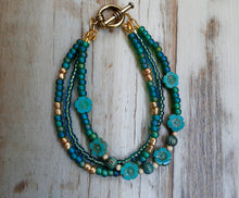 Load image into Gallery viewer, Aqua And Gold Multi Strand Crystal Bracelet
